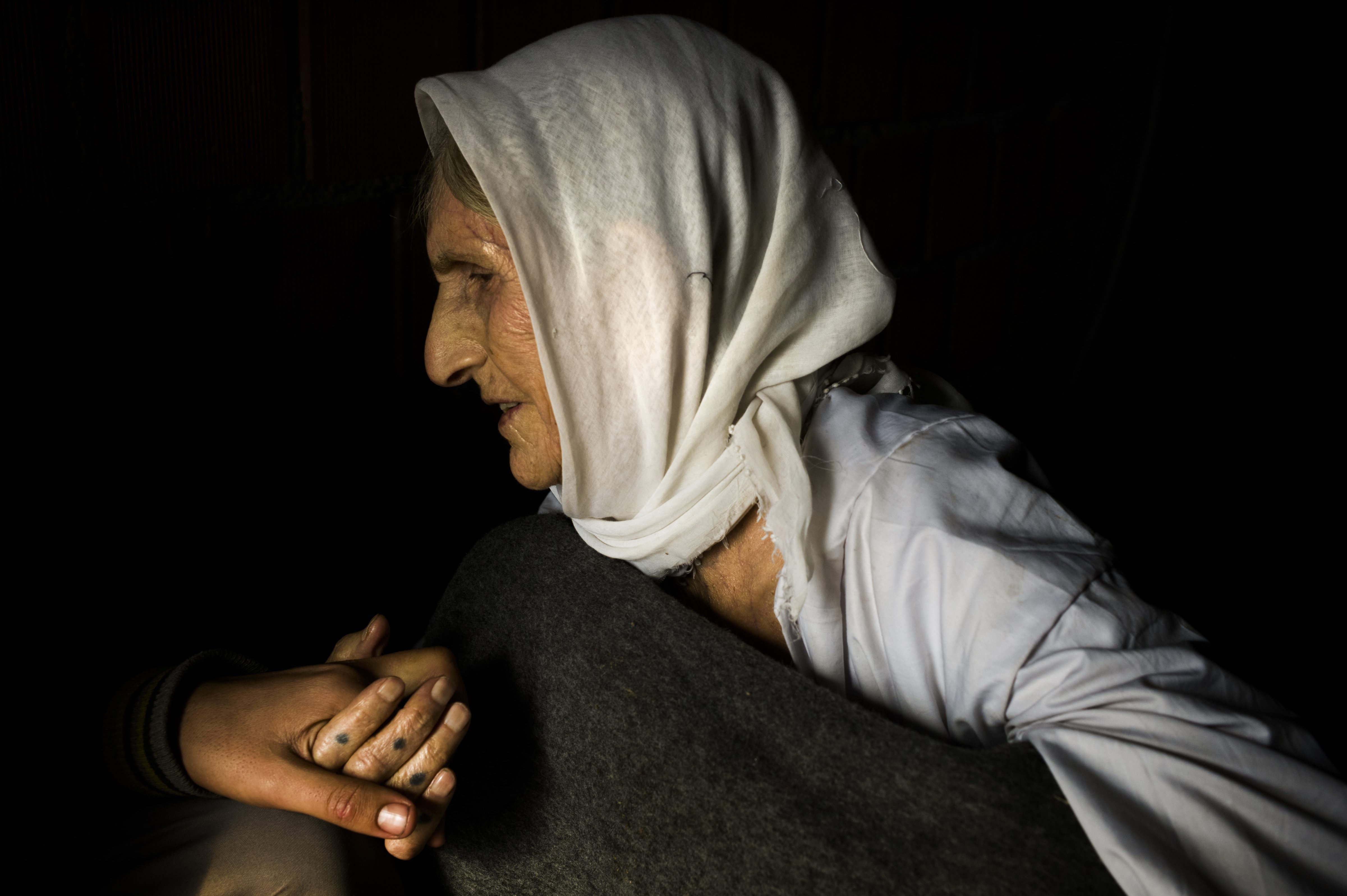 Gowre, from Sinjar, lives on the seventh floor of an unfinished apartment block in ‘Daben City’, Dohuk, a housing estate with five buildings filled with more than 7000 internally displaced Yazidis.