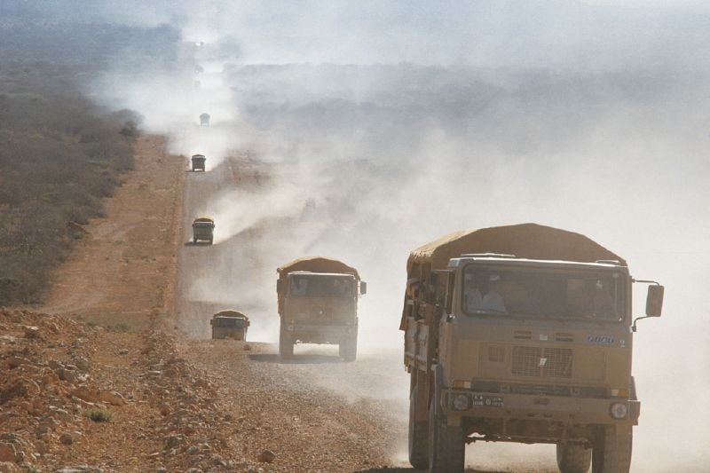 WFP trucks convoy delivering food supplies during a relief effort in Somalia WFP trucks convoy delivered food supplies during a relief effort in Somalia