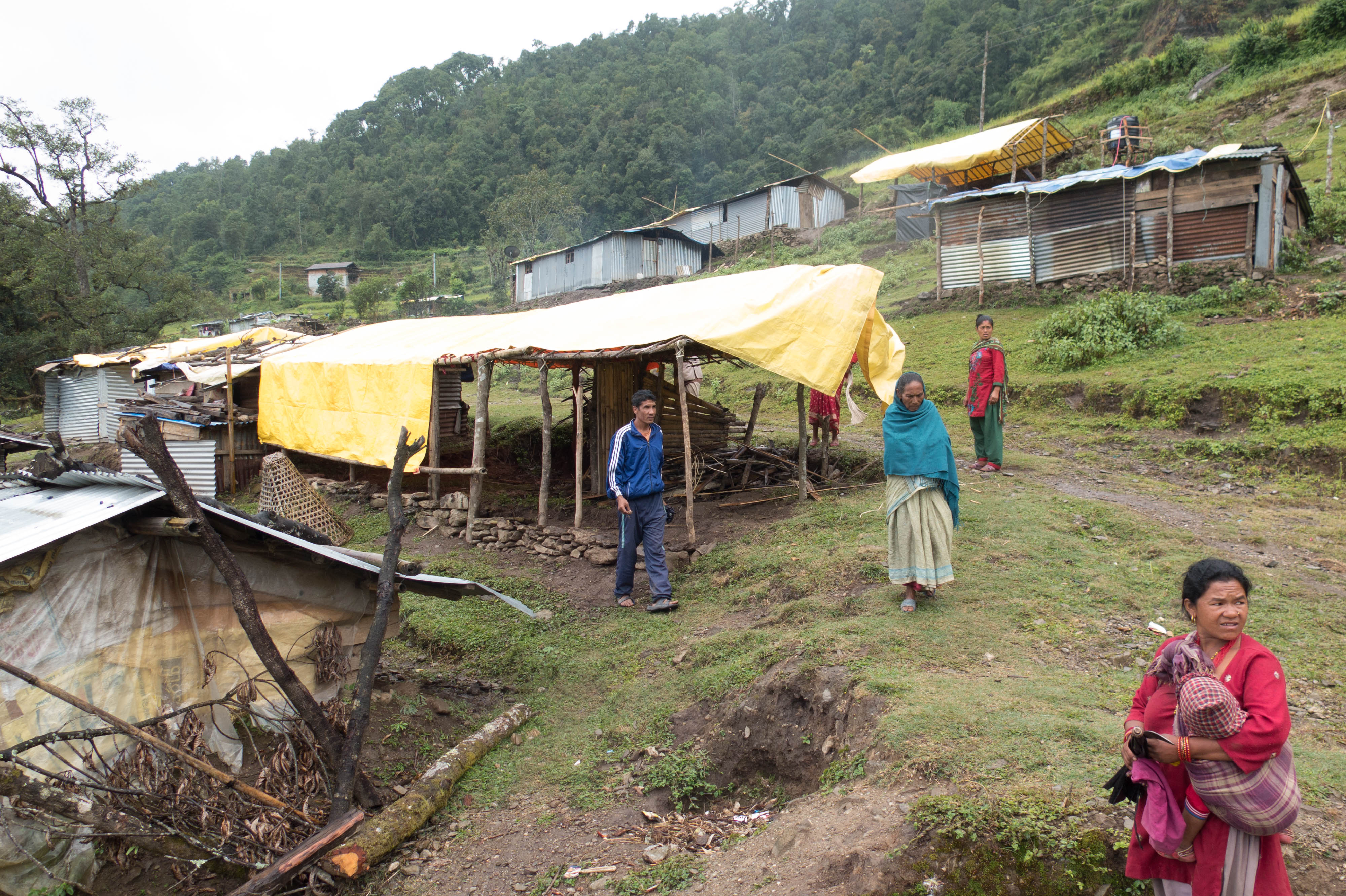 Displaced people living in a temporary camp in October 2015 in Nepal's Dolakha district, which was at the epicentre of an earthquake on 25 April 2015