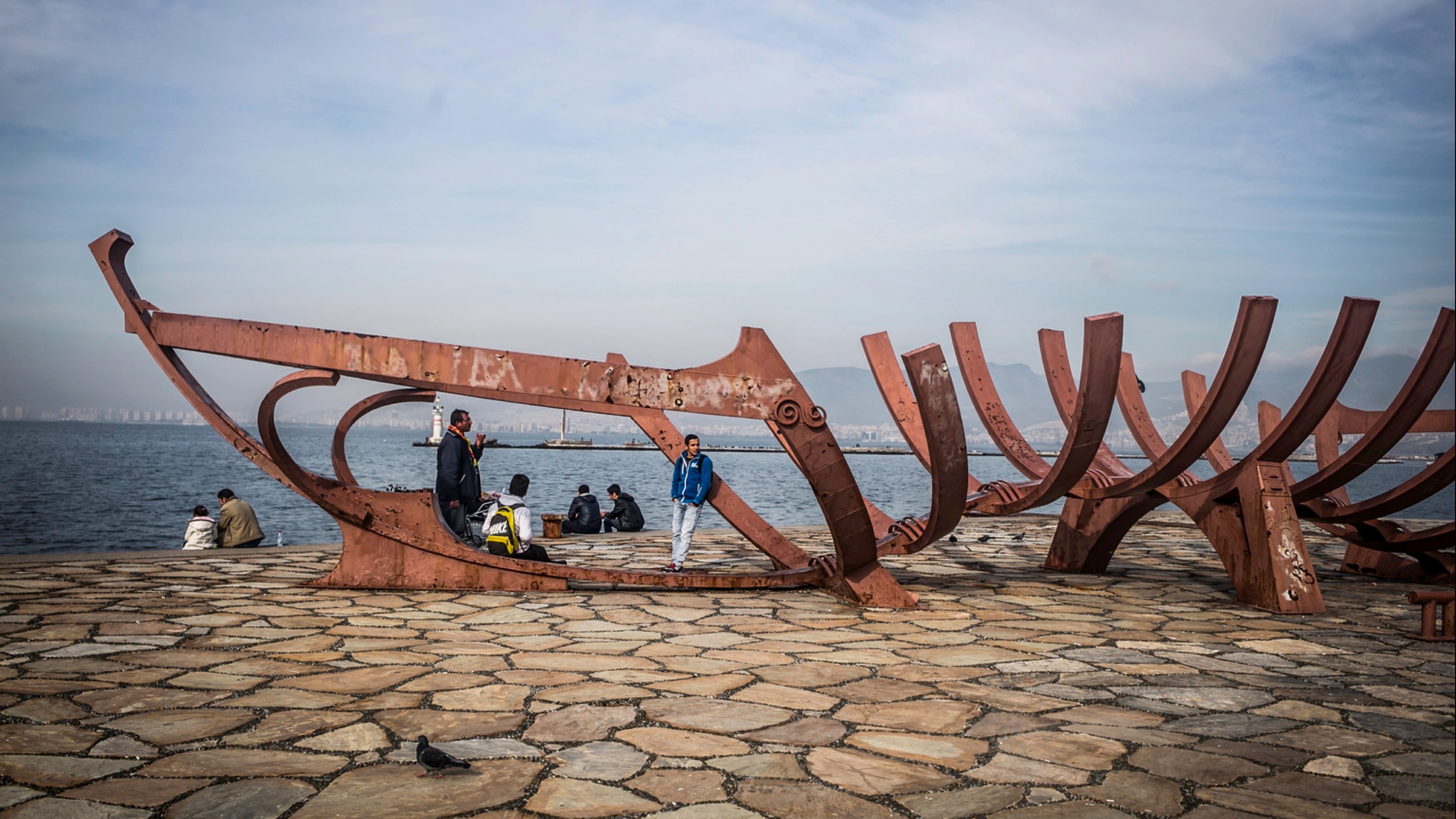 Refugees continue to make their way to Izmir despite the EU's three-billion-euro deal with Turkey aimed at stemming the flow of migrants and refugees crossing to Europe 