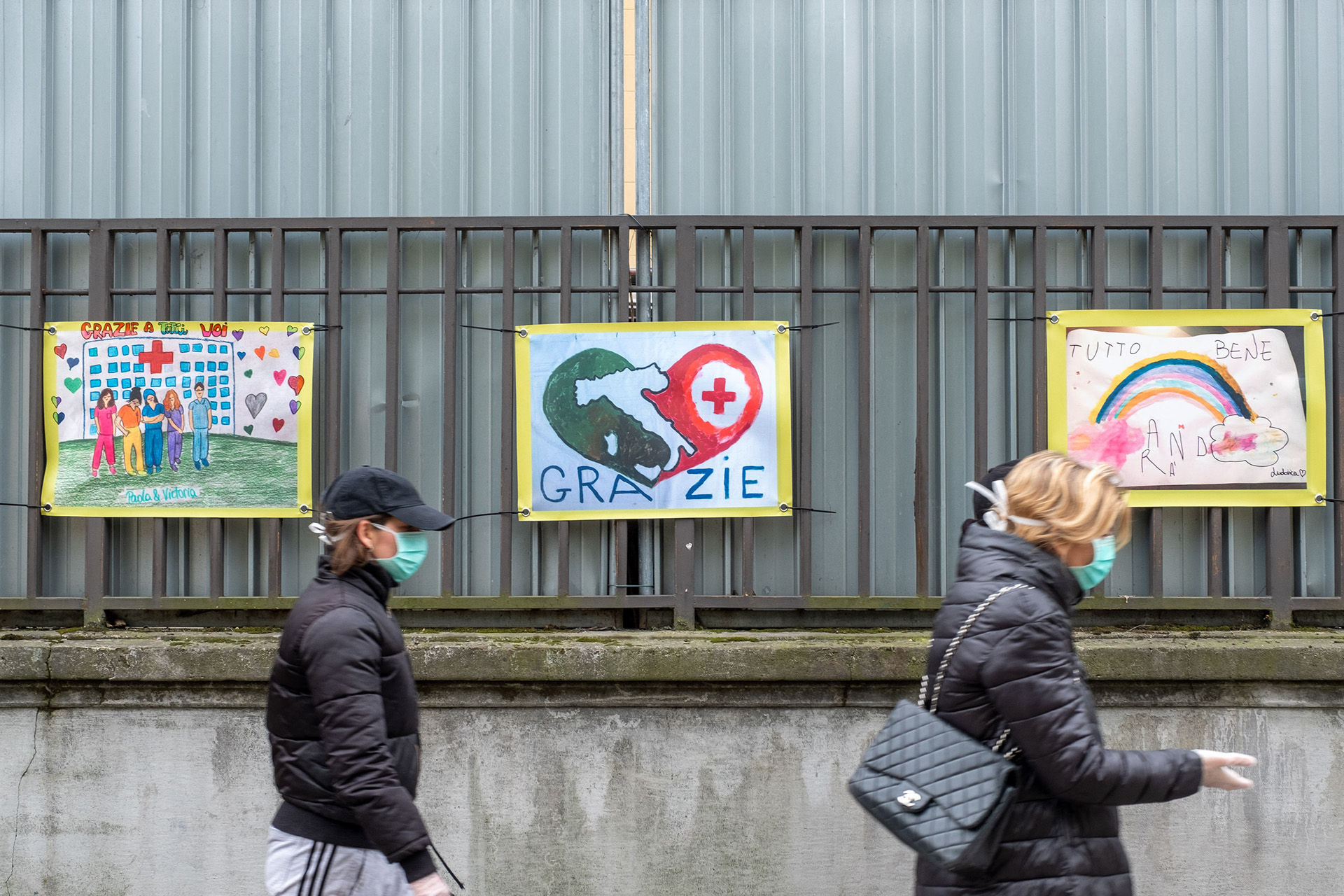 A series of colourful drawings in front of an emergency room in Milan