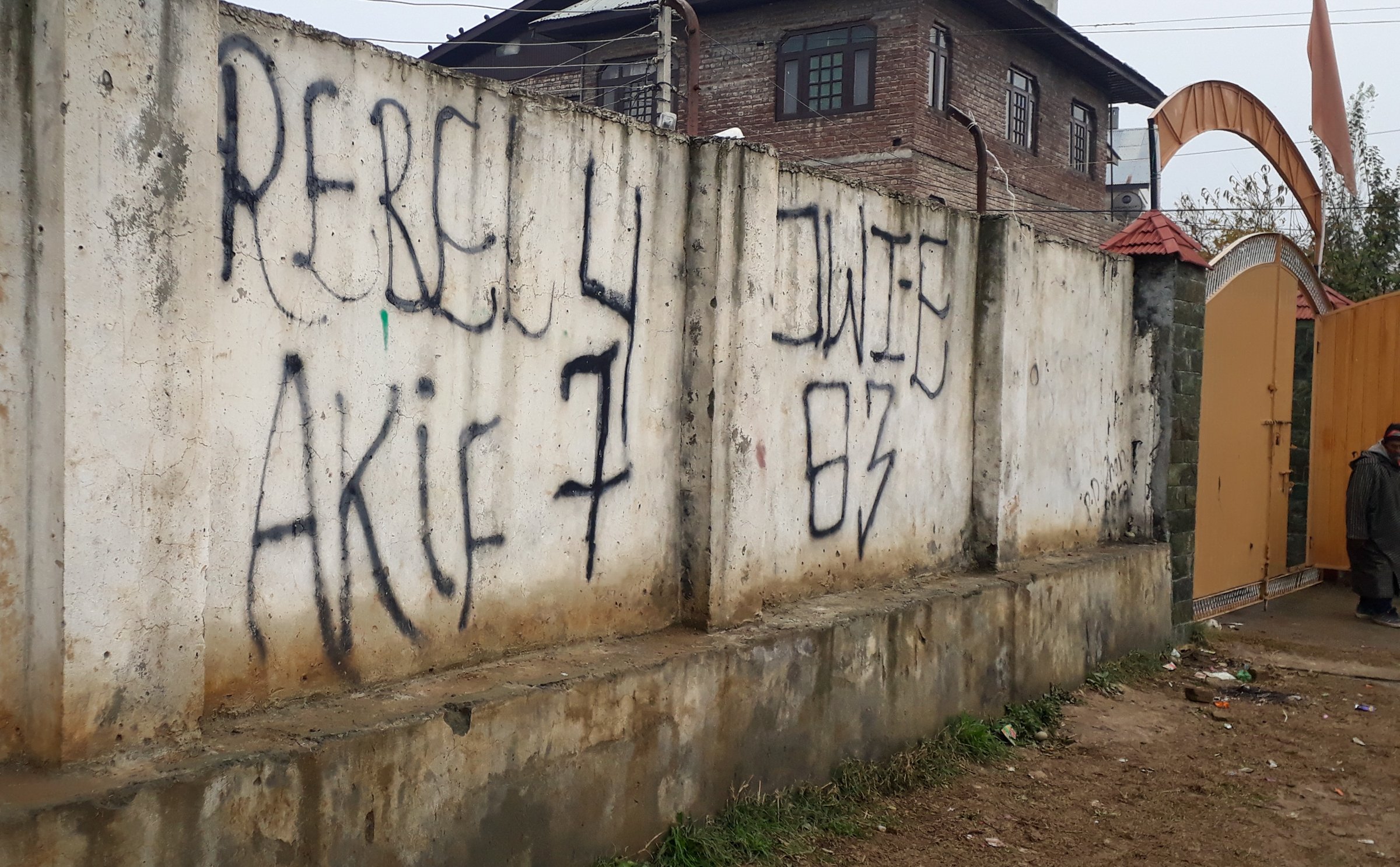 Anti-government graffiti has been painted on the wall of a school in Srinagar, Kashmir.