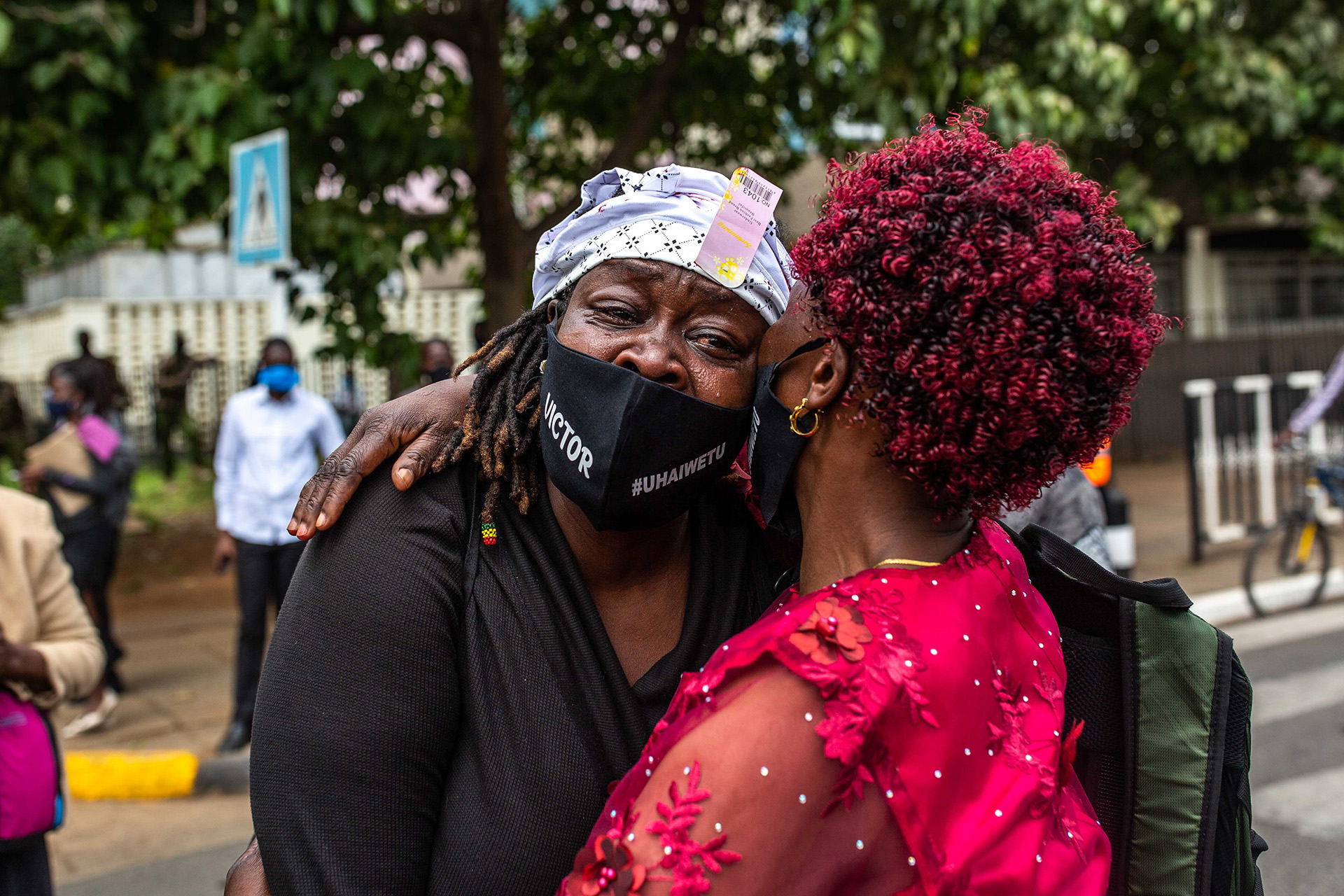 Mothers whose sons were killed by Kenyan police gather in front of Kenya’s parliament