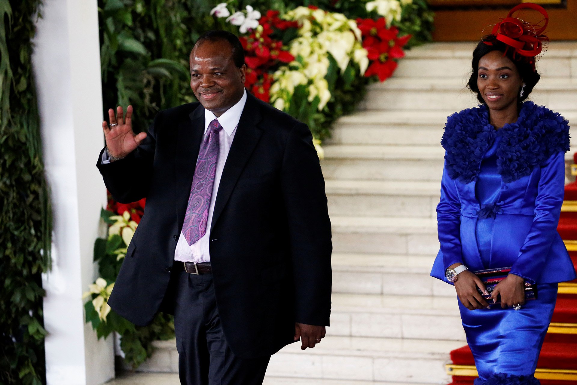 Eswatini’s King Mswati III and his wife, Siphelele Mashwama, greet journalists on a diplomatic trip to Indonesia in 2019.