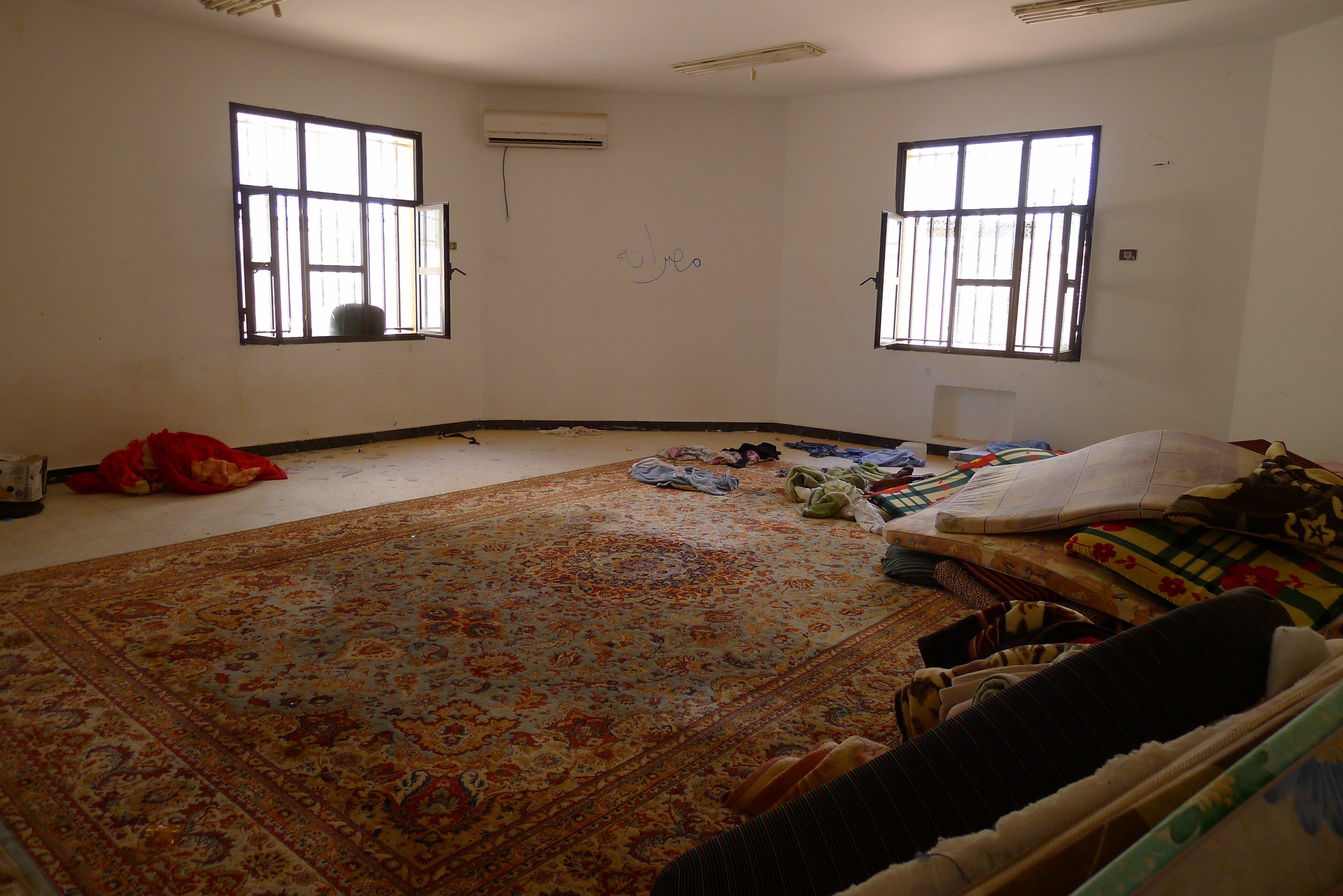 A large room filled with mattresses