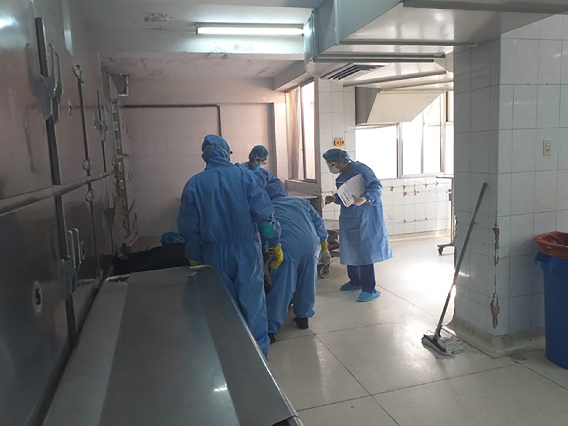 Testing for COVID-19 at the central morgue in Lima