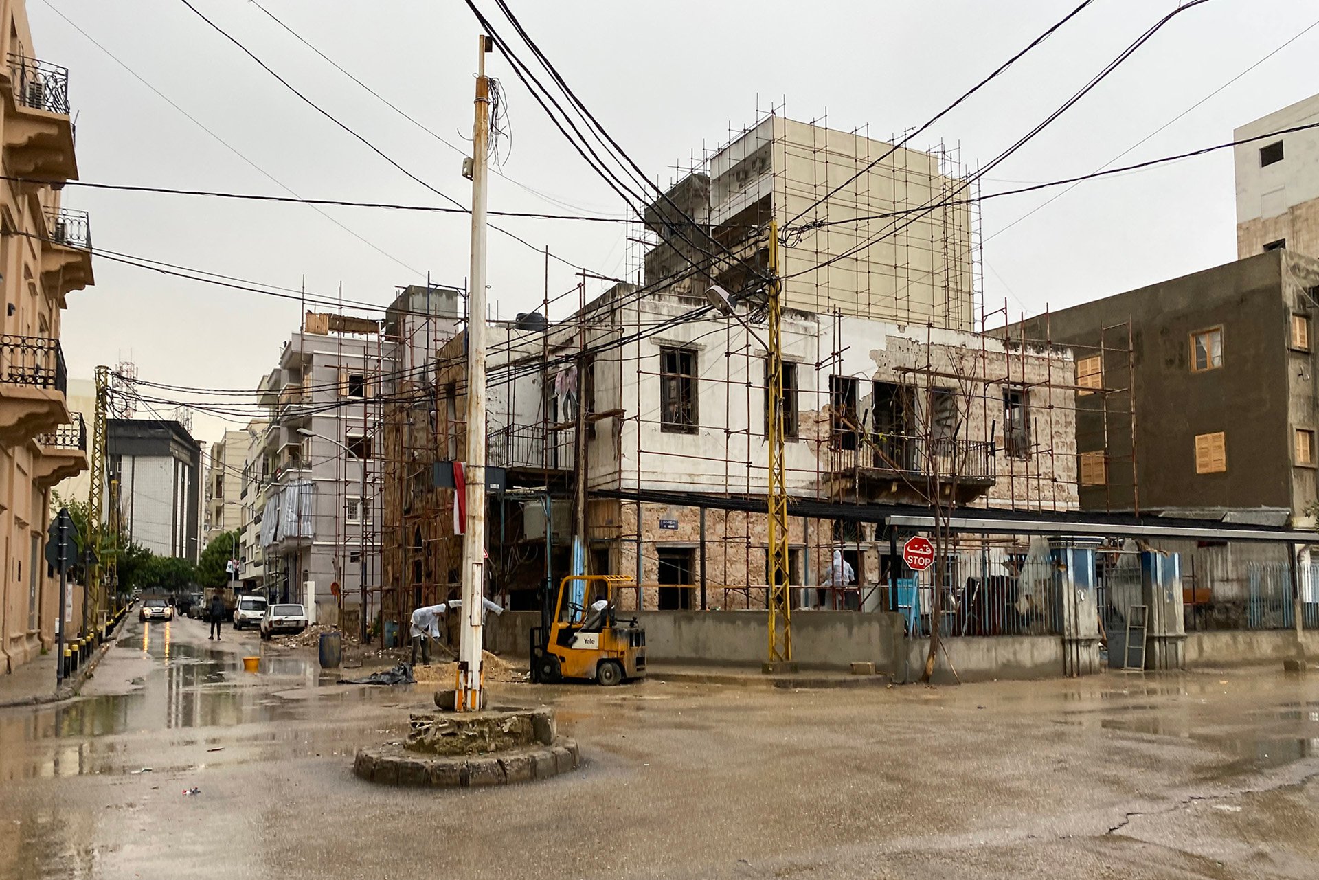 A photo shows scaffolding on a building in Beirut's Karantina neighborhood where residents fear their homes are at risk of further damages or even collapse during winter rains.