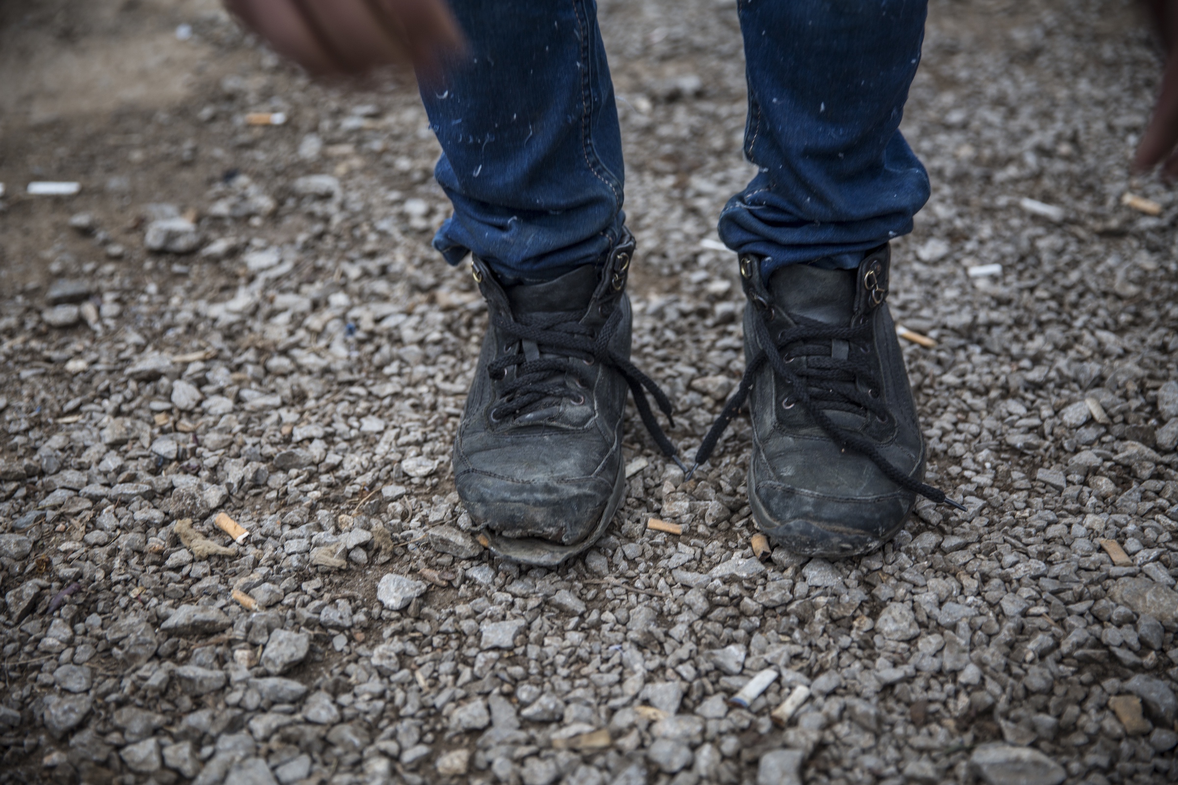 An Afghan man's broken boots after traveling through Iran, Turkey, Bulgaria and arriving in Serbia