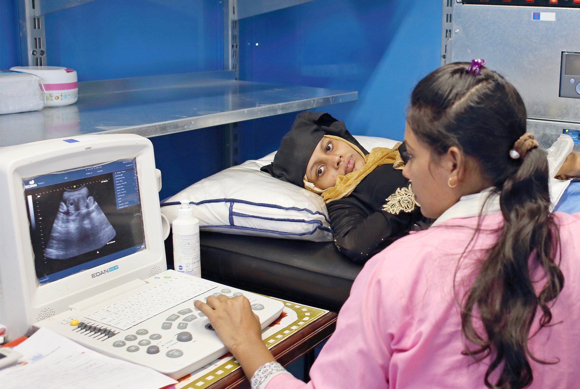 A pregnant Rohingya woman in a medical office