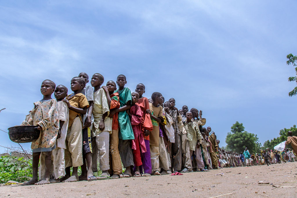 Nigerian nternally displaced children waiting for ready-to-use therapeutic food