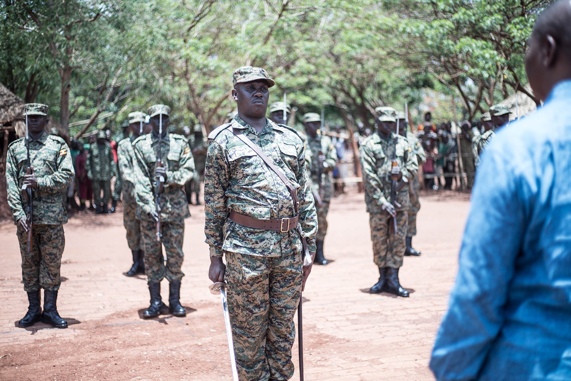 Ugandan soldiers stand to attention