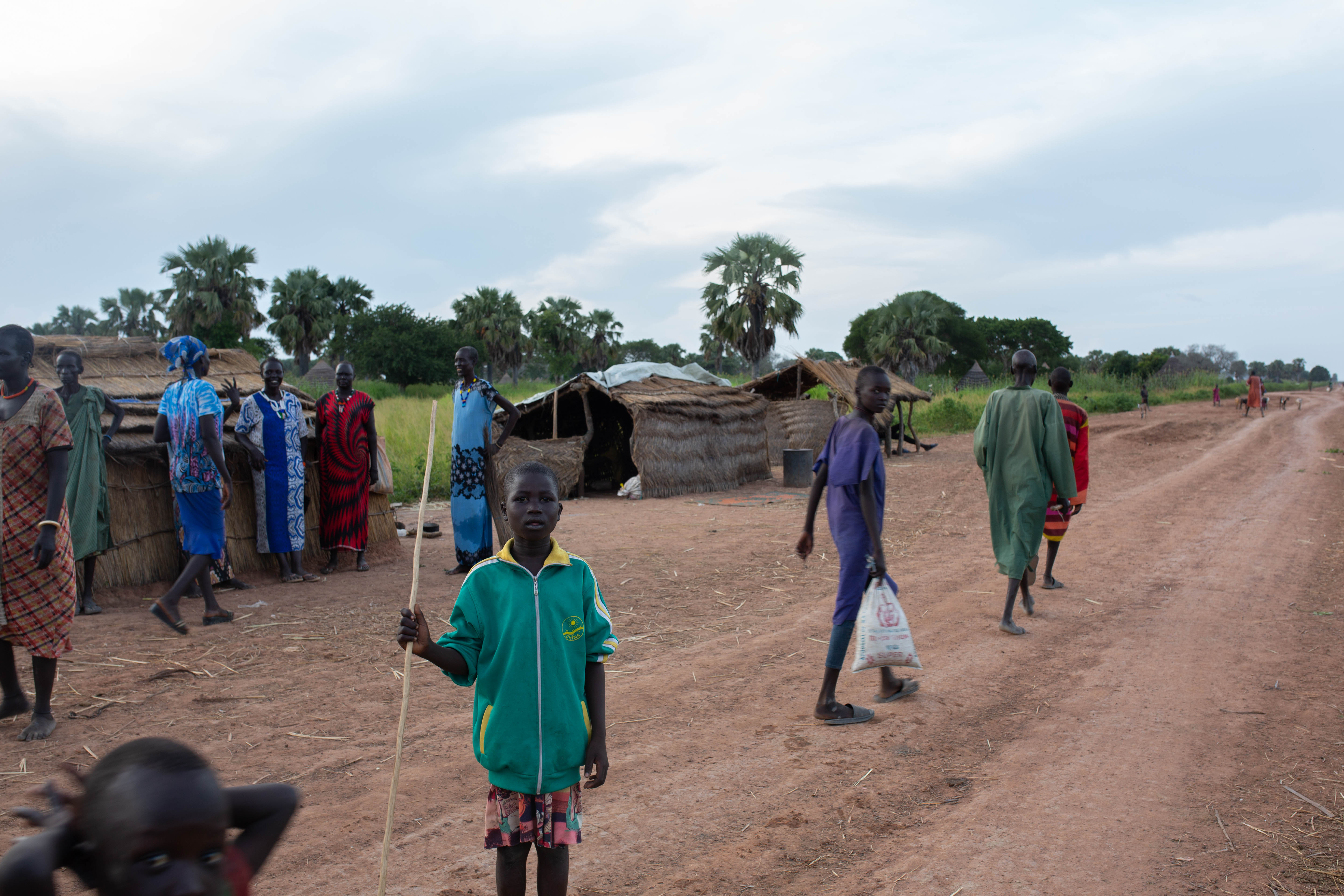 Flood victims live by the side of the road in Mabior Yar, in Warrap state. “Vehicles often pass by, but nobody stops to help us,” said resident Amou Agang.