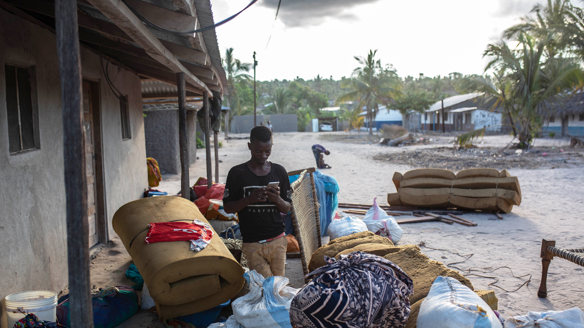 Sponge mattresses and sacks of maize are among the items salvaged by displaced families who fled their village in Cabo Delgado last month.