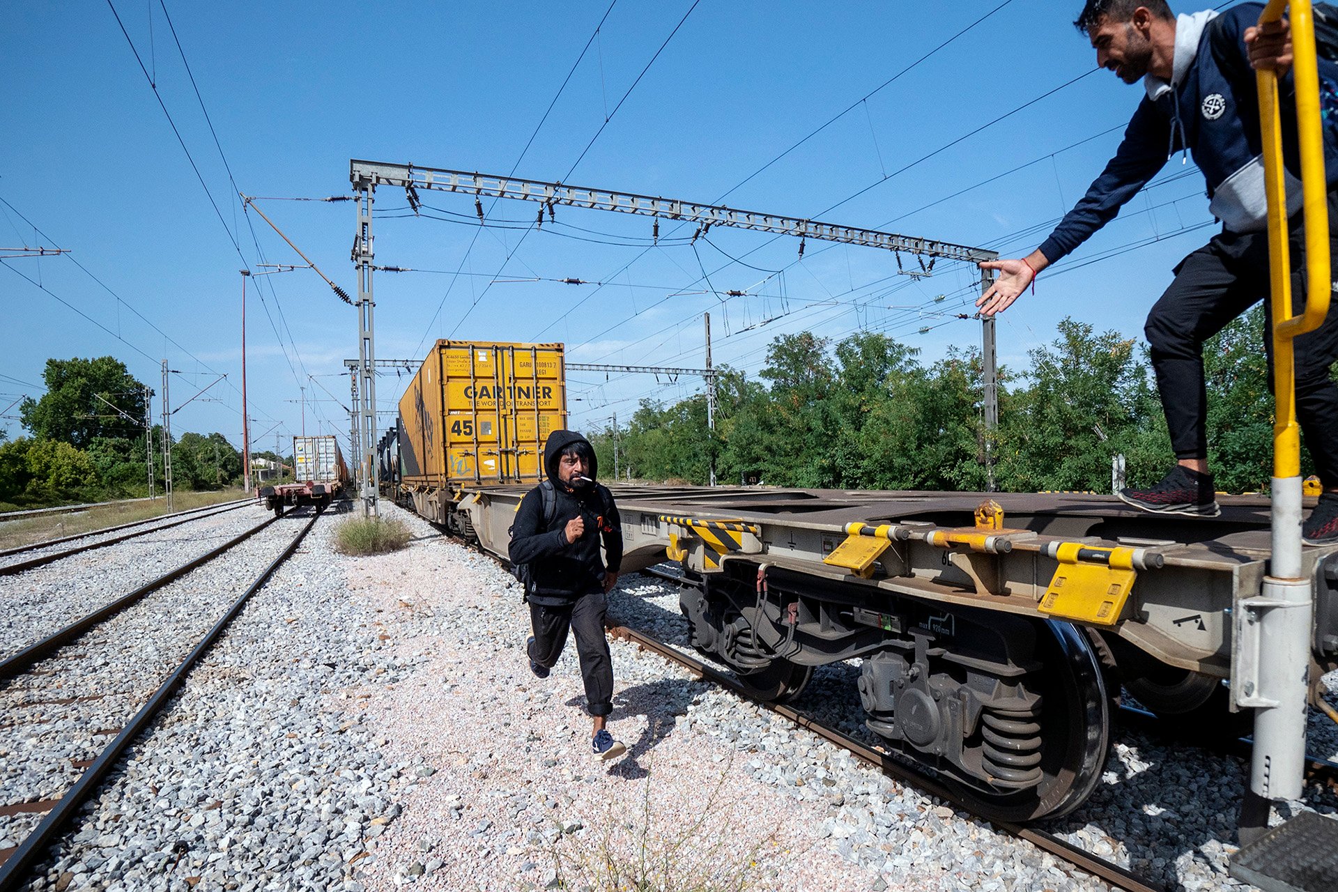 On Greece’s borders with Albania and North Macedonia, refugees seek to continue their trip up north, often jumping on trains or passing through the Balkan route by foot.