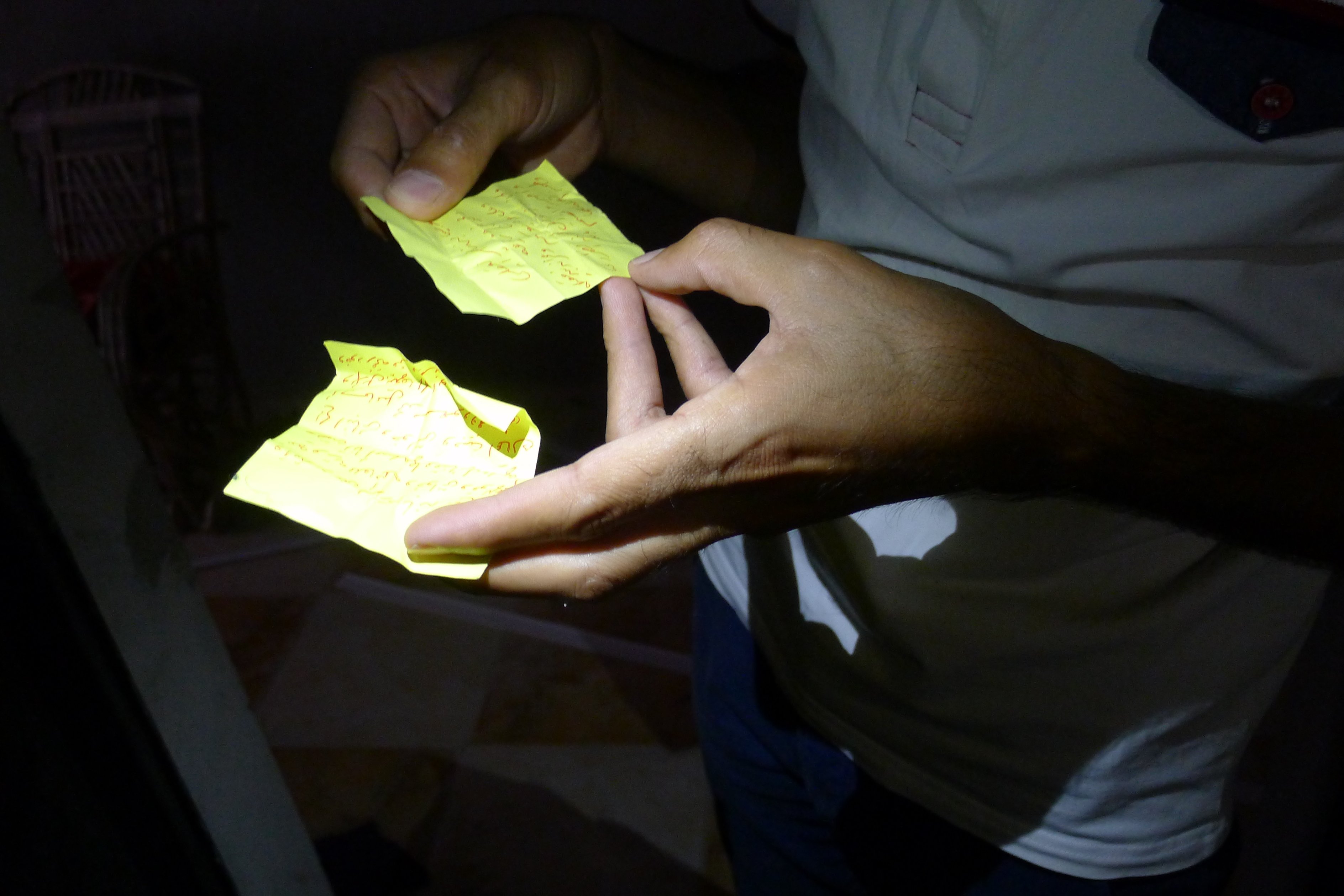 Man reading post-it notes