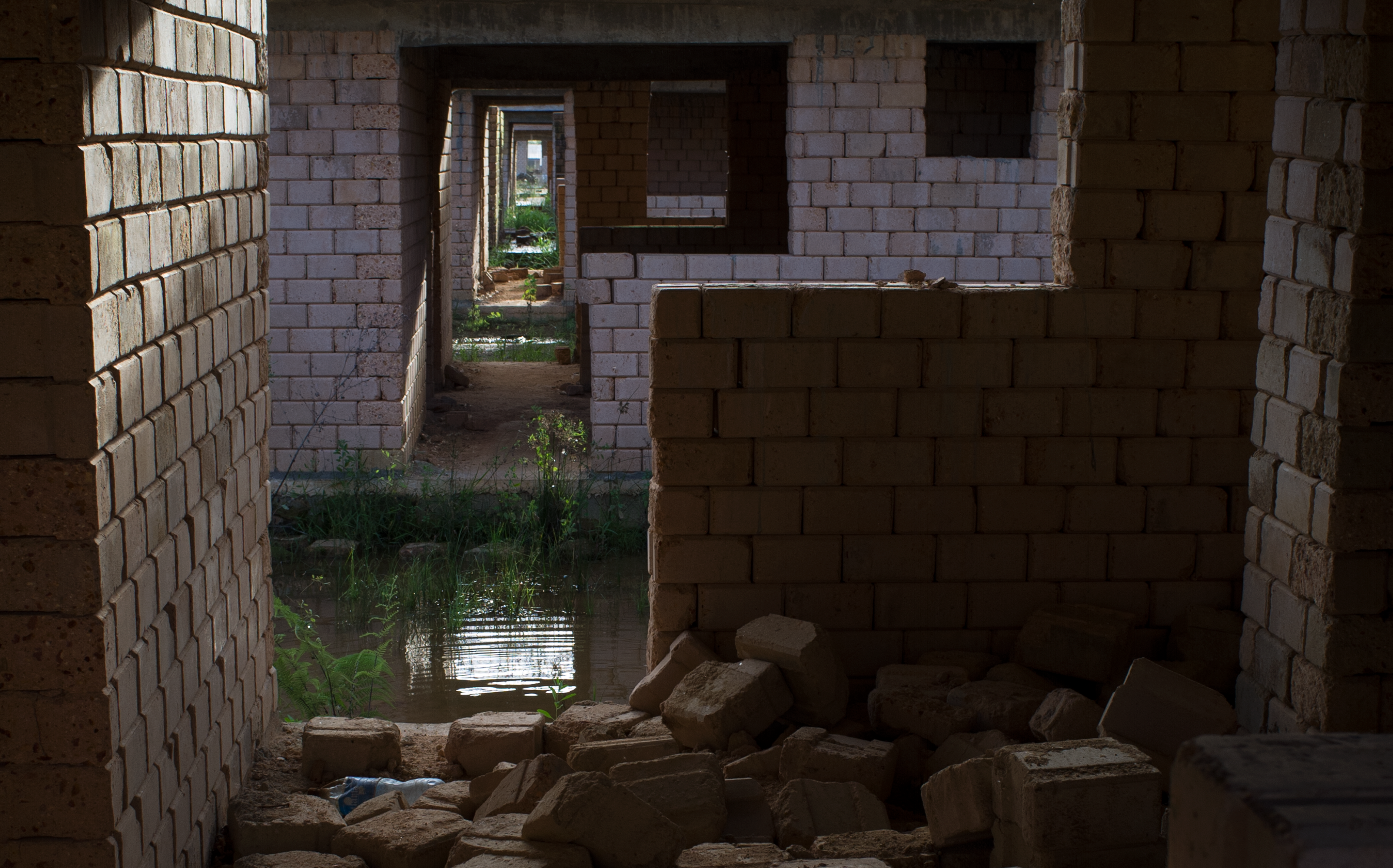 Some of the improved houses have a roof but lack windows