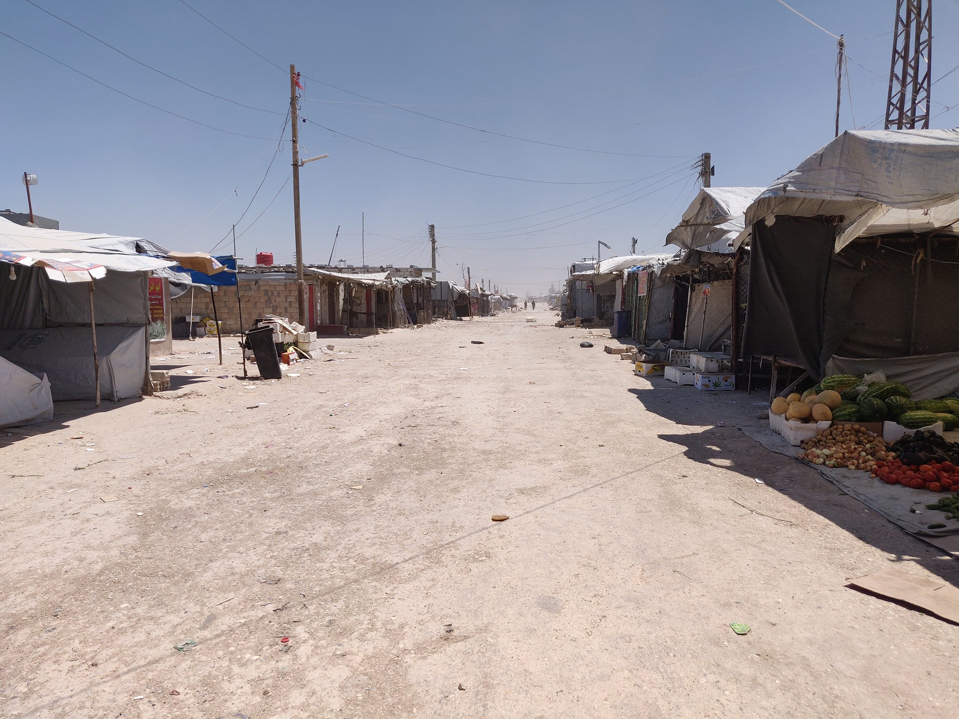 Photo of an empty market in Syria's al-Hol camp.