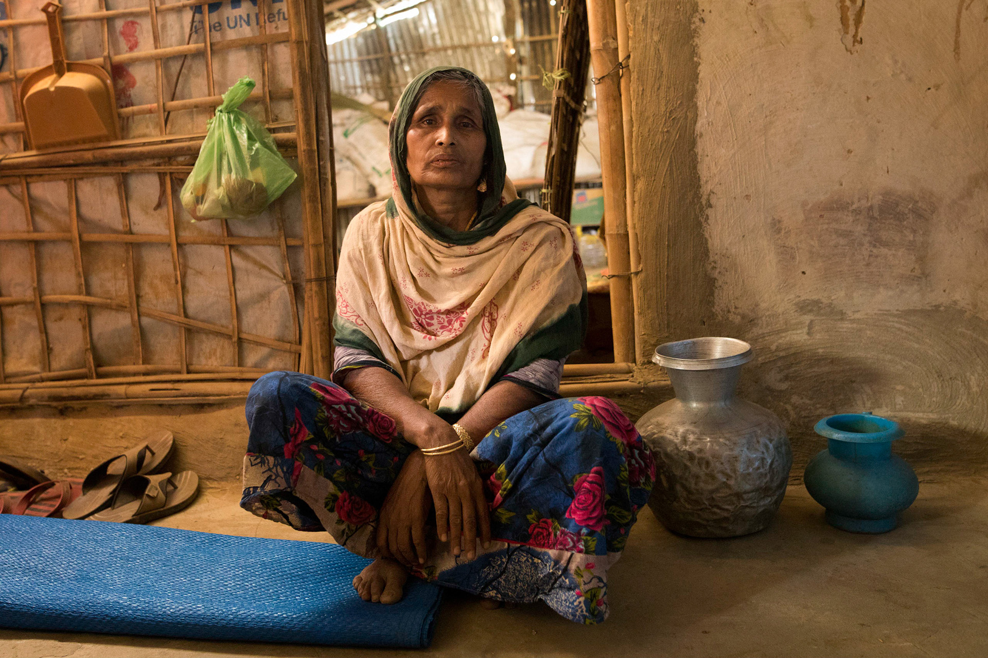 Zohora Khatun, 55, let several Rohingya families stay on her land when the refugee crisis erupted in August 2017. She believes more help should be given to local communities.