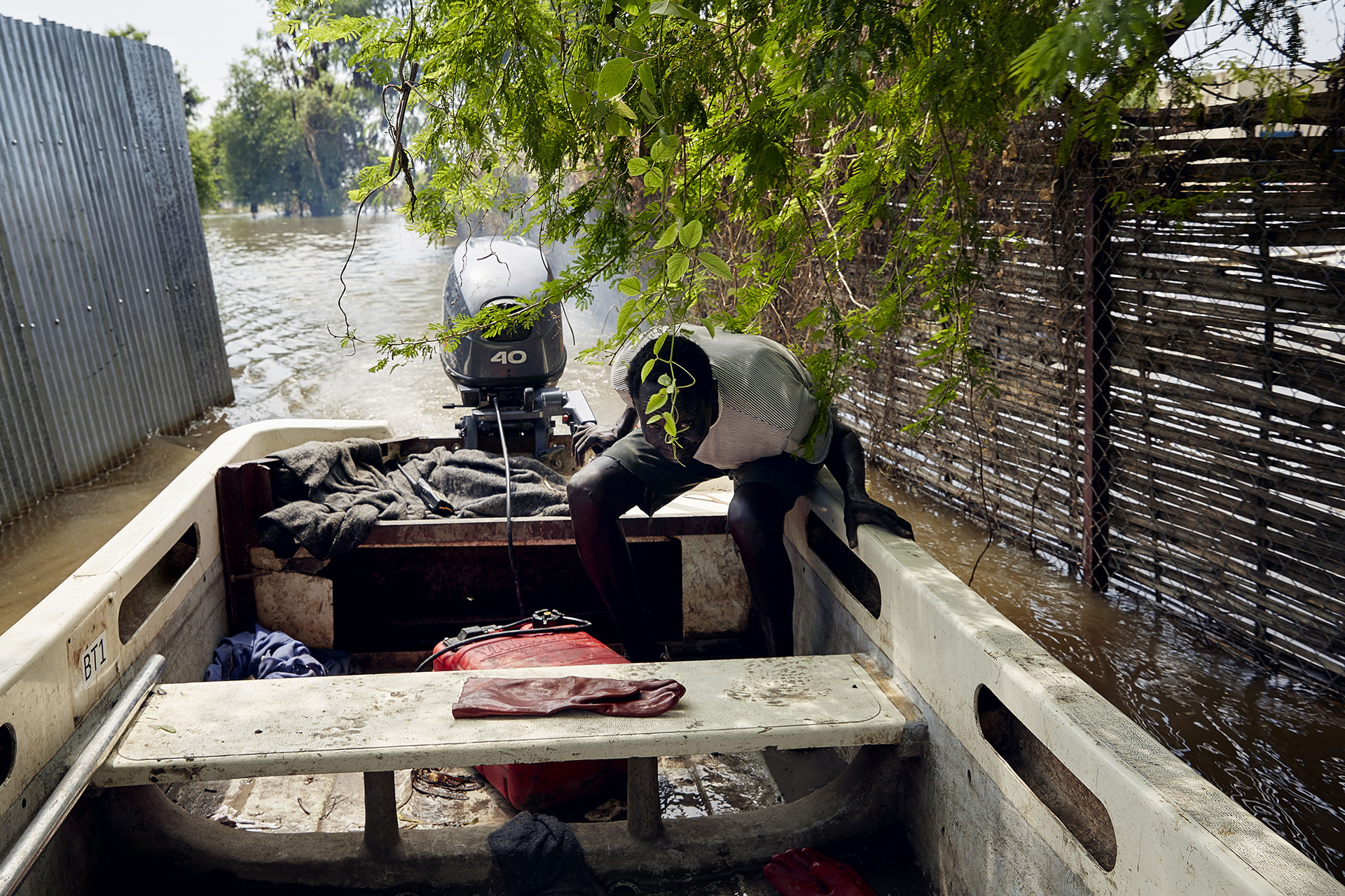 A man drives a speedboat along what was once a footpath in central Pibor. The national government “has not yet taken any initiative towards this situation”, said the governor of Pibor, David Yau Yau.