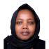 This is a headshot of Rahma Hassan. She is pictured looking at the camera with a calm expression. She wears a black headscarf.