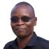 Headshot of Joseph Maina.