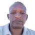 A headshot of Oscar Nkala.