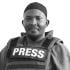 A headshot of Mohamed Zakaria.