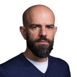 A headshot of Tammam Aloudat. 