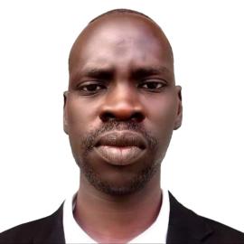 A headshot of Mamer Abraham.