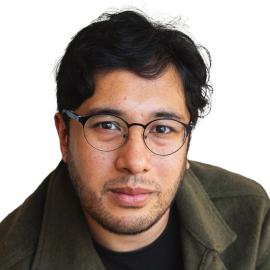 A headshot of Nathan Akehurst. 