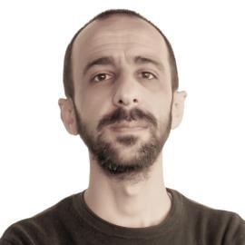 A headshot of Adnan Mansour Azzam. 
