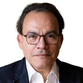 A headshot of Khaled Mansour.