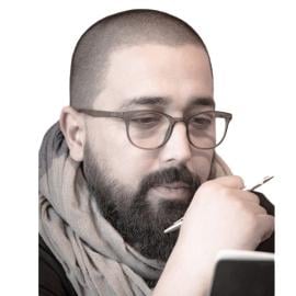 A headshot of Migue Roth.