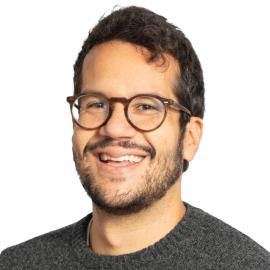 A headshot of Albert Souza Mulli.