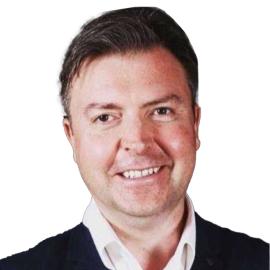 A headshot of Ben Phillips.