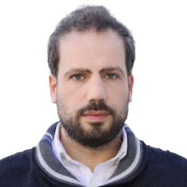 A headshot of Alaa Sarhal.