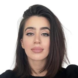 A headshot of Mozhda Poyan.