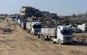 Trucks carrying aid move, amid a ceasefire between Israel and Hamas, in Rafah in the southern Gaza Strip, February 13, 2025.