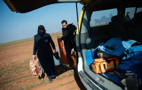 Deminer Lama Haj Kaddour with a fellow Halo Trust deminer on a clearance mission in rural Aleppo province