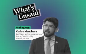 What's Unsaid podcast teaser picture with a portrait photo in black and white of Carlos Menchaca, legislator, activist, organizer, and former New York City Council Member.. To his left we see his name with his title. These elements are placed over a radial gradient background. The colour at the centre is a purplish blue and the colour outside is green. On the top is the title of the podcast: What’s Unsaid