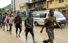 Newly recruited youth joining Tigrayan forces march through the village of Nebelet, northern Tigray, Ethiopia, July 11, 2021.
