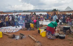 Burundian volunteers prepare food for Congolese families at Rugombo Stadium, after Congolese fled from renewed clashes between M23 rebels and the Armed Forces of the Democratic Republic of the Congo (FARDC), in Rugombo commune of Cibitoke Province, Burundi February 18, 2025.