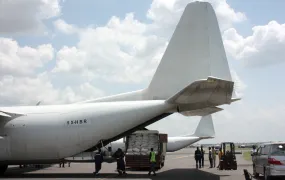 A BAR Aviation plane waiting to be loaded with sacks of food aid destined for the town of Nasir, on 9 June 2025, at Juba International Airport. 