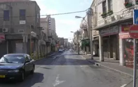  A deserted street near the port of Haifa, Israel, 25 July 2006. According to officials, more than 405 Lebanese and 51 Israelis have died in violence since Hezbollah militants captured two Israeli soldiers in a cross-border raid on 12 July. Correspondents