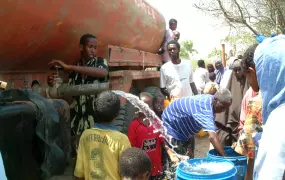 A water tanker delivers much needed water to IDPs to the south of Mogadishu the water was delivered by the Local Civil Society groups, Mogadishu, Somalia, 9 April 2007.