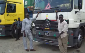 Truck drivers at a truck station outside Port Sudan.