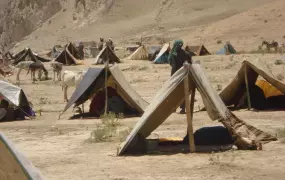 The tents of IDPs from Alburz District in a desert close to Mazar-i Sharif on 25 June 2008. The IDPs say drought and food-insecurity forced them to abandon their homes in search of aid in urban areas.