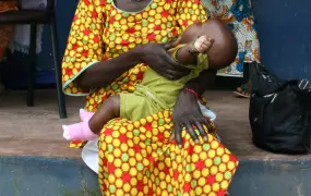 Woman waiting for her baby to be vaccinated at San Domingos hospital 90km from Bissau