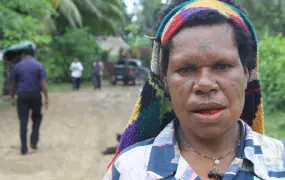 A woman outside the provincial capital of Madang. The native population is largely Melanesian and Papuan but is divided into many distinct cultures