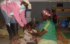 A child receiving care for cholera in a classroom set up to treat cholera patients, village of Sirak, Cameroon's Extreme North region. July 2010